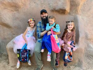 A family in Halloween costumes at Animal World and Snake Farm Zoo's Halloween event