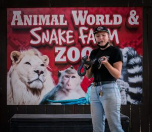 a keeper handles a show snake, Spring Break San Antonio animal encounters